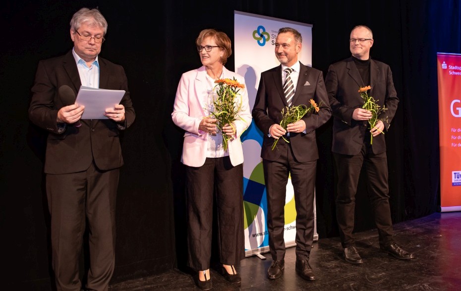 Gruppenfoto mit 4 Personen